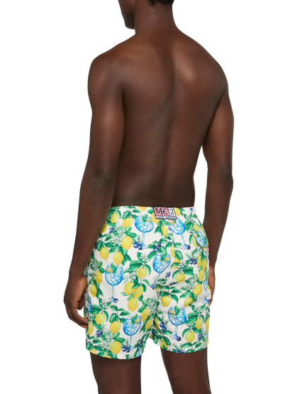 Mid-length Gustavia swim-shorts with gin and lemons print