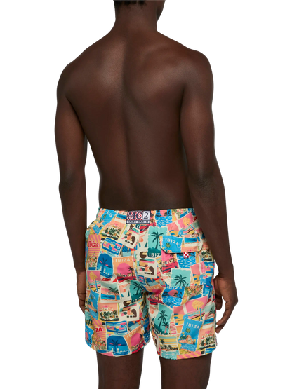 Mid-length Gustavia swim-shorts with Ibiza postcard print | AI CO-CREATED DESIGN BY RICKDICK - POWERED BY RED-EYE